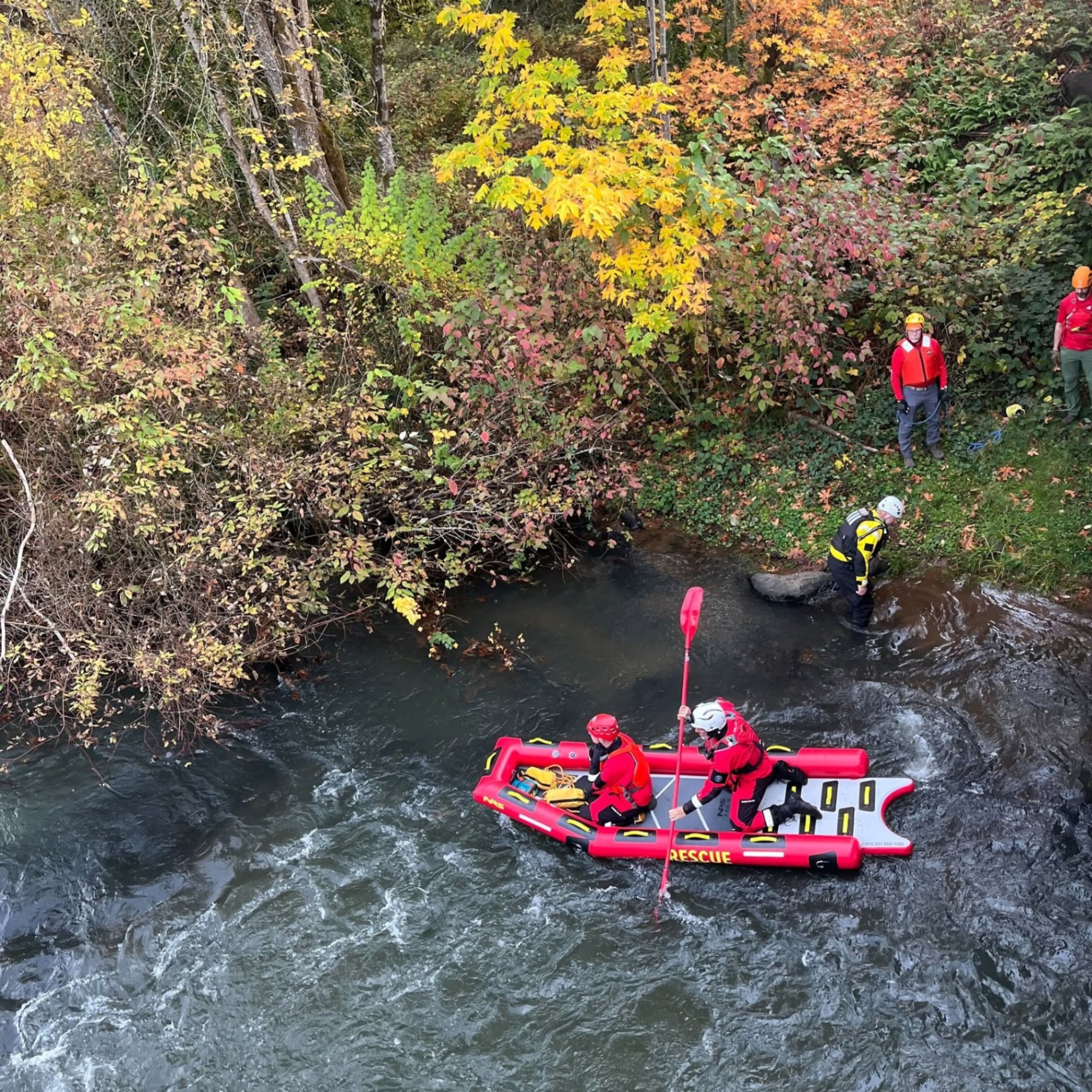 Lane County Sheriff's Office water rescue team assisting community members